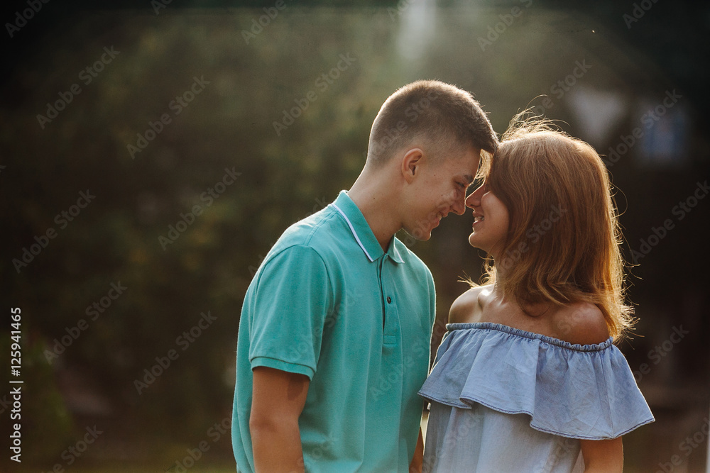 Fototapeta premium guy and girl in the park