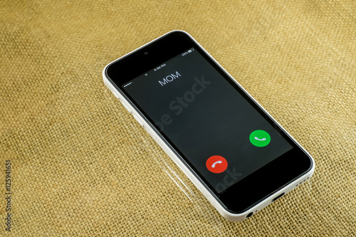 smartphone Incoming mother calls. The love that everyone gets .