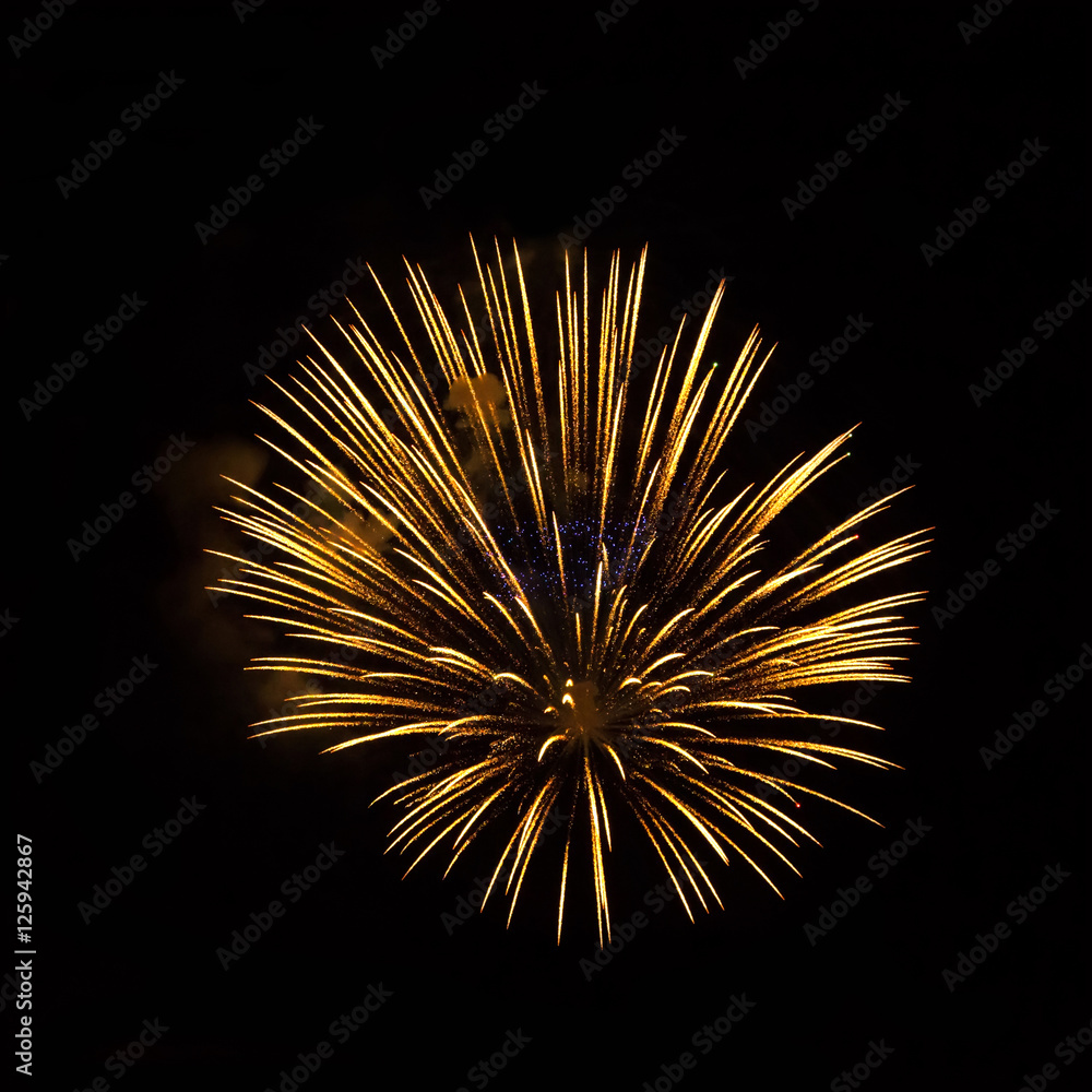 Obraz premium Golden fireworks on black background
