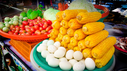 Veggies and fruits, papaya , tomato , corn , mango , salted egg , eggplant , garnish for papaya Salad Shop Popular menu in Thailand.