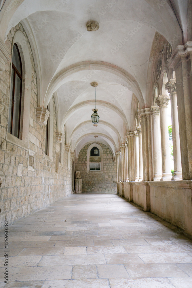The austere hallway of the Dominican Monastery in the old town of Dubrovnik, Croatia.