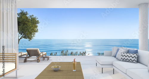 3d rendering contemporary nice living room near beach and blue sky