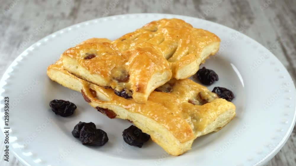 Delicious homemade pastry on a white plate. Seamless loopable. Prores 4K. Delicious homemade pastry on a white plate. Seamless loopable. Prores 4K.