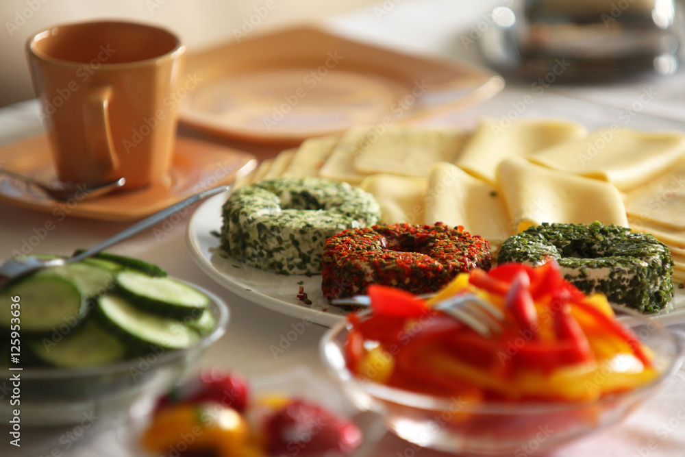 Breakfast Table Closeup cheese plate vegetables 2 Breakfast Table Closeup cheese plate vegetables 2