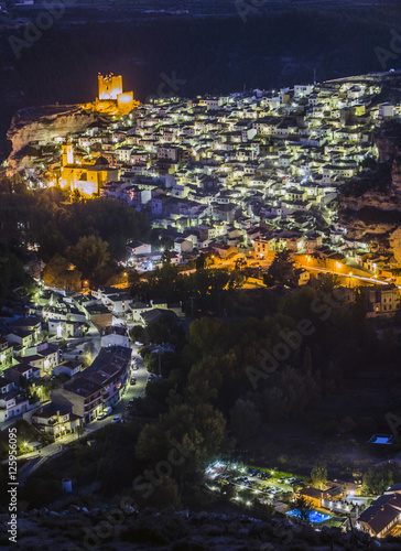 Night view of the city, on top of limestone mountain, Alcala del Jucar, Spain © Felipe Caparrós
