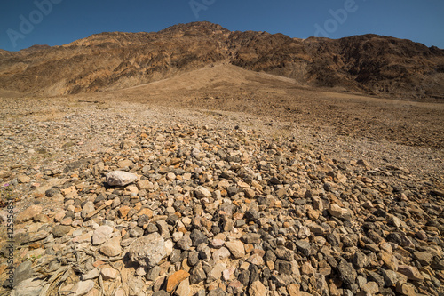 Dry rocks after erosion in Death Valley National Park, CA, USA