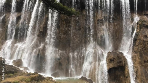 Grand  Great waterfalls at Jiuzhaigou National Park  where is the UNESCO World Heritage in Sichuan , China in  Autumn in November located in  in  Tibetan-Qiang of Sichuan ,China