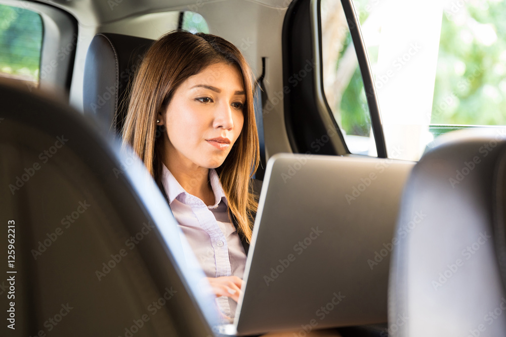 Businesswoman working on a laptop