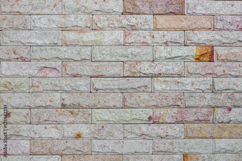 Obraz premium brick wall texture sandstone walls background. The pattern,