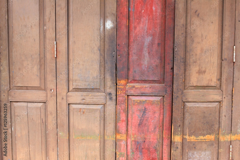 Wood texture background. The centuries-old wooden house wall 