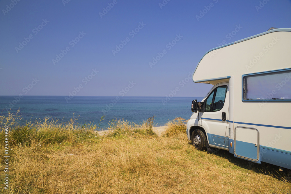 caravan car holiday by the sea background