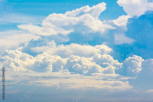 Fototapeta Naklejka Na Ścianę i Meble -  The blue cloudy sky on bright natural background.