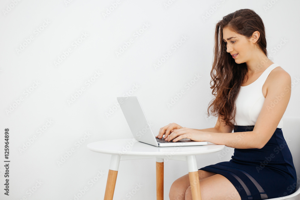 Attractive Caucasian fitness woman is eating salad with healthy glass of juice - Fitness and Diet concept Attractive Caucasian fitness woman is eating salad with healthy glass of juice - Fitness and Diet concept