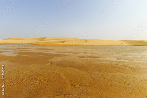 water landscape in the dunes of the Sahara Desert photo