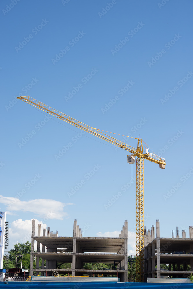 Industrial construction cranes with blue sky Industrial construction cranes with blue sky