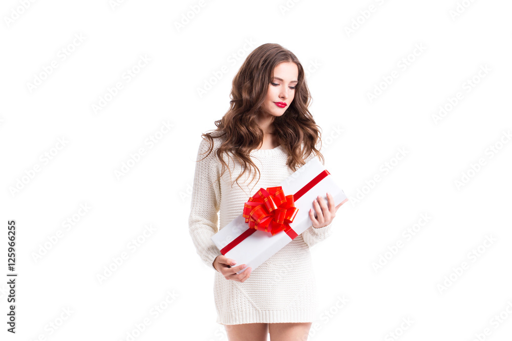 Beautiful woman with a gift - a white box with a red ribbon. Beautiful woman with a gift - a white box with a red ribbon.
