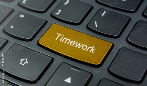 Obraz na plátně Business Concept: Close-up the Timework button on the keyboard and have Gold, Ye