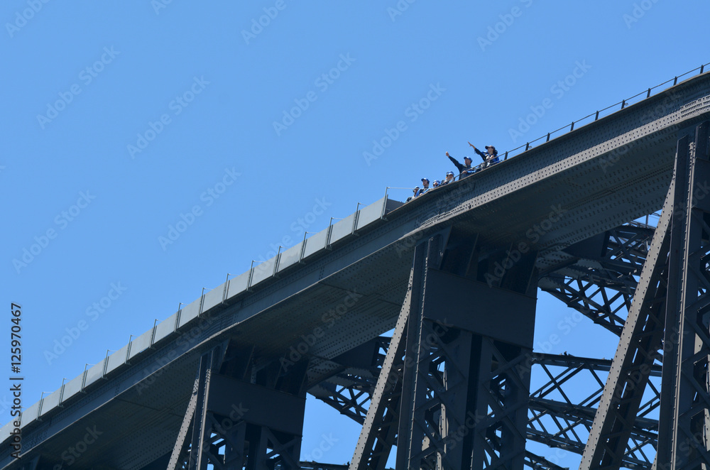 People climb on Sydney Harbour Bridge in Sydney Australia People climb on Sydney Harbour Bridge in Sydney Australia