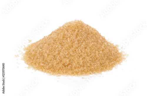 Crystals cane sugar heap close up isolated on white