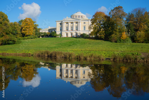 Pavlovsk Palace and its reflection sunny October afternoon. Pavlovsk, Saint-Petersburg. Russia