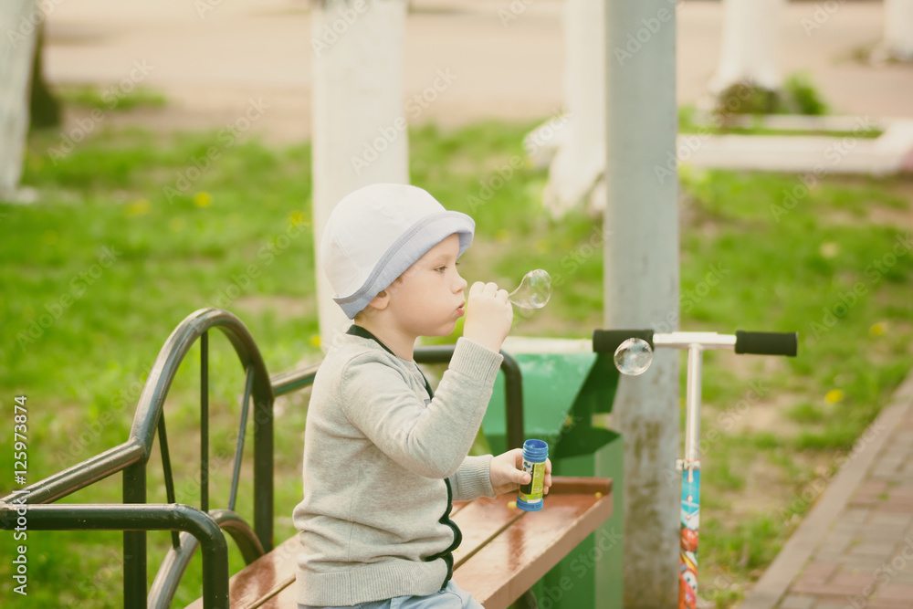 boy blowing bubbles boy blowing bubbles