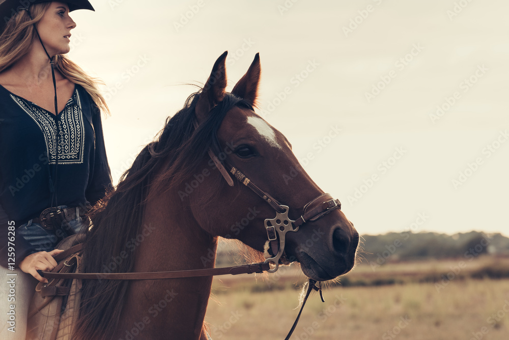 Fototapeta premium Girl Riding Horse During Sunset on Mallorca