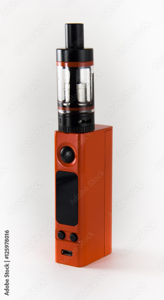 Orange E-cigarette or vaping device. Close up. Orange E-cigarette or vaping device. Close up.