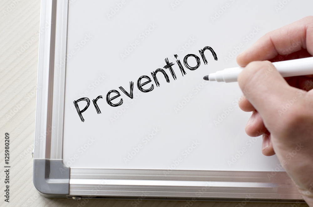 Prevention written on whiteboard Prevention written on whiteboard