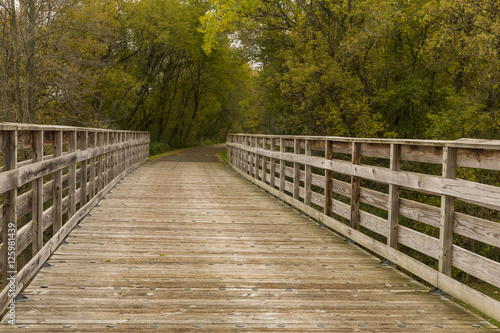 Fototapeta Naklejka Na Ścianę i Meble -  Bike Trail Bridge in Autumn
