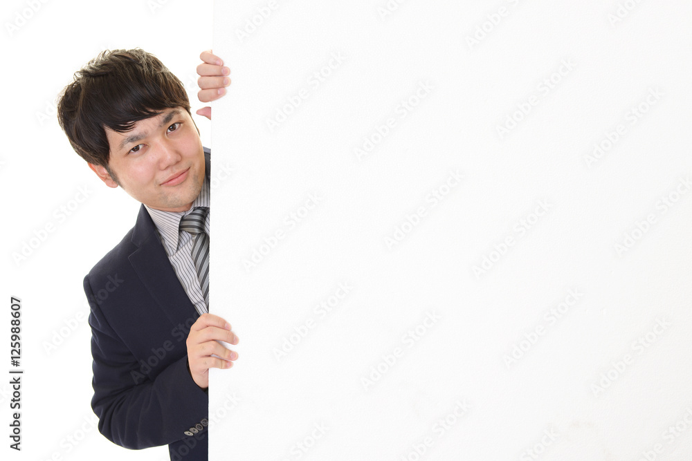 ホワイトボードを持つ笑顔の男性 ホワイトボードを持つ笑顔の男性