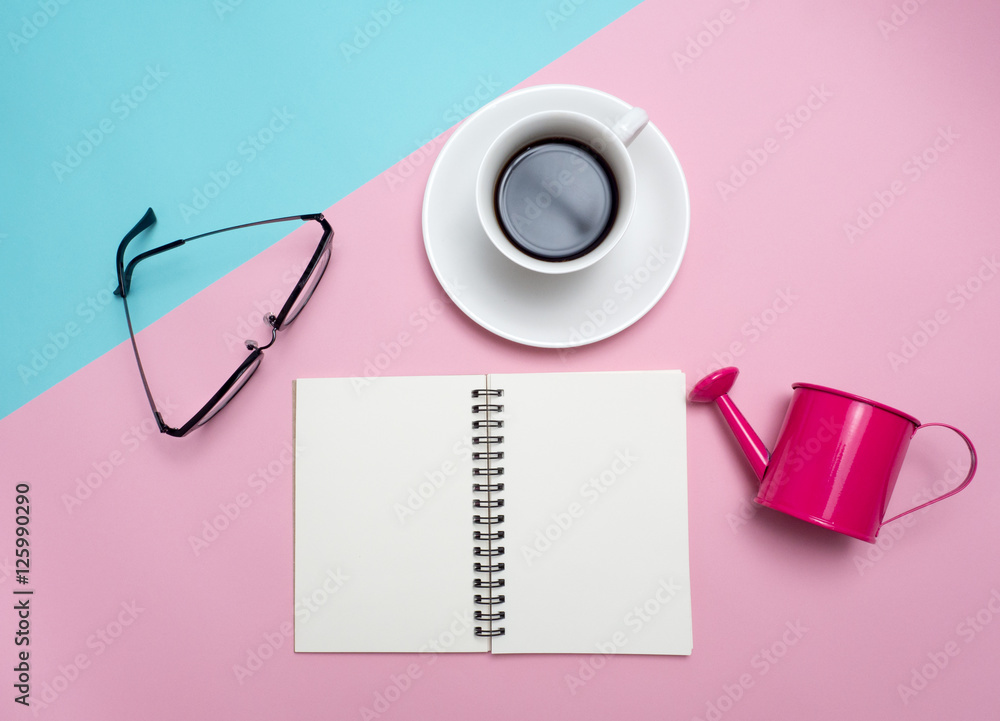 Top view of colorful cup of coffee and glasses on color blue and pink  background for create idea for business or design .Relax coffee time .
 (flat lay) - obrazy, fototapety, plakaty 