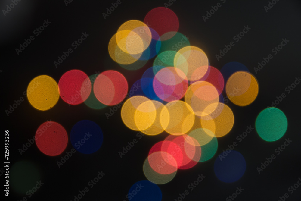 abstract lights bright on a black background, as the substrate for the holiday, unclear, vague abstract lights bright on a black background, as the substrate for the holiday, unclear, vague