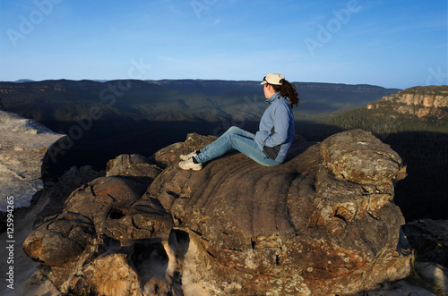 Woman looks at the landscape from Lincoln Rock Lookout at sunris © Rafael Ben-Ari