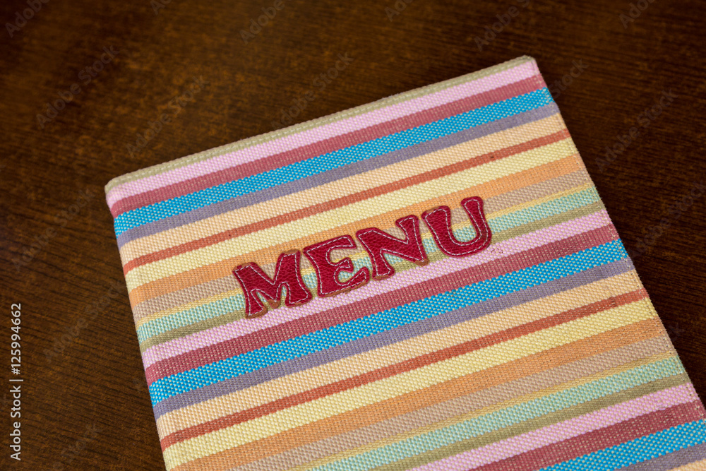 Menu with knit cover of a restaurant in Kotor, Montenegro Menu with knit cover of a restaurant in Kotor, Montenegro