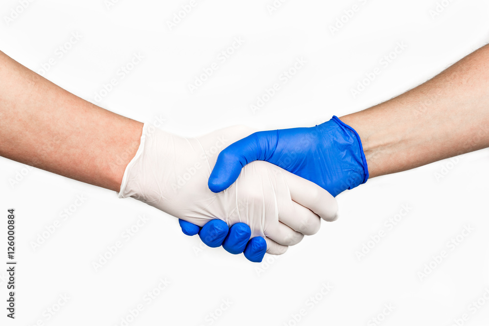 Handshake with blue and white medical gloves, profile view on white  background. Stock-Foto | Adobe Stock