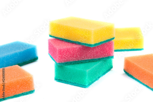 colored sponges on white background