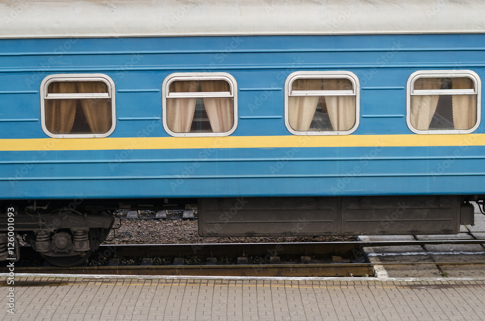 Naklejka premium The train on the platform of railroad station in Ivano-Frankivsk , Ukraine .