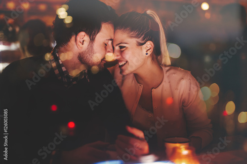 Fototapeta Romantic couple dating in pub