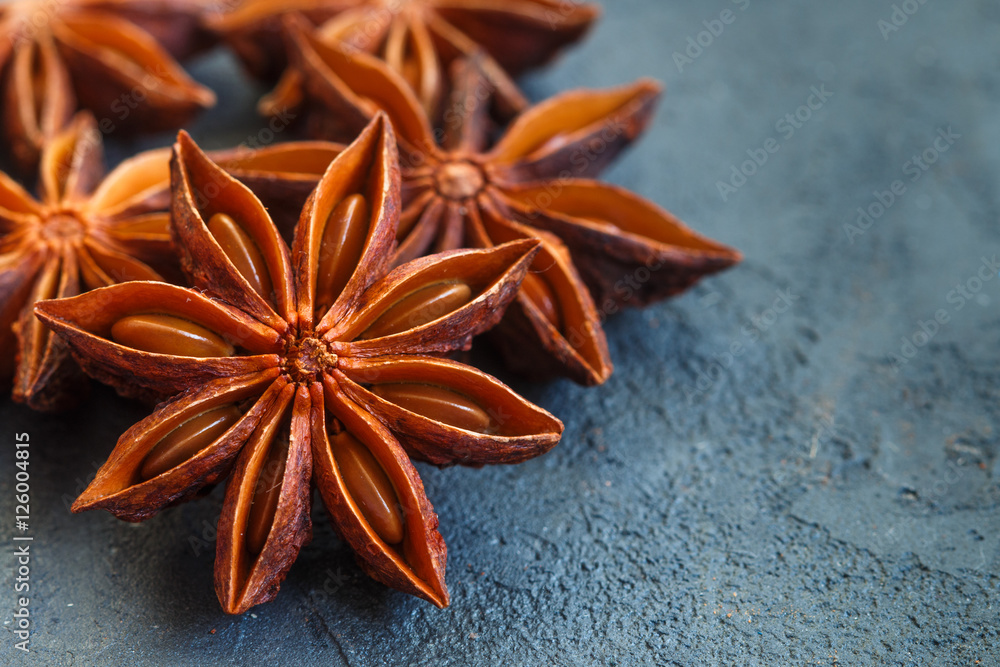 Star anise on black table. Selective focus Star anise on black table. Selective focus