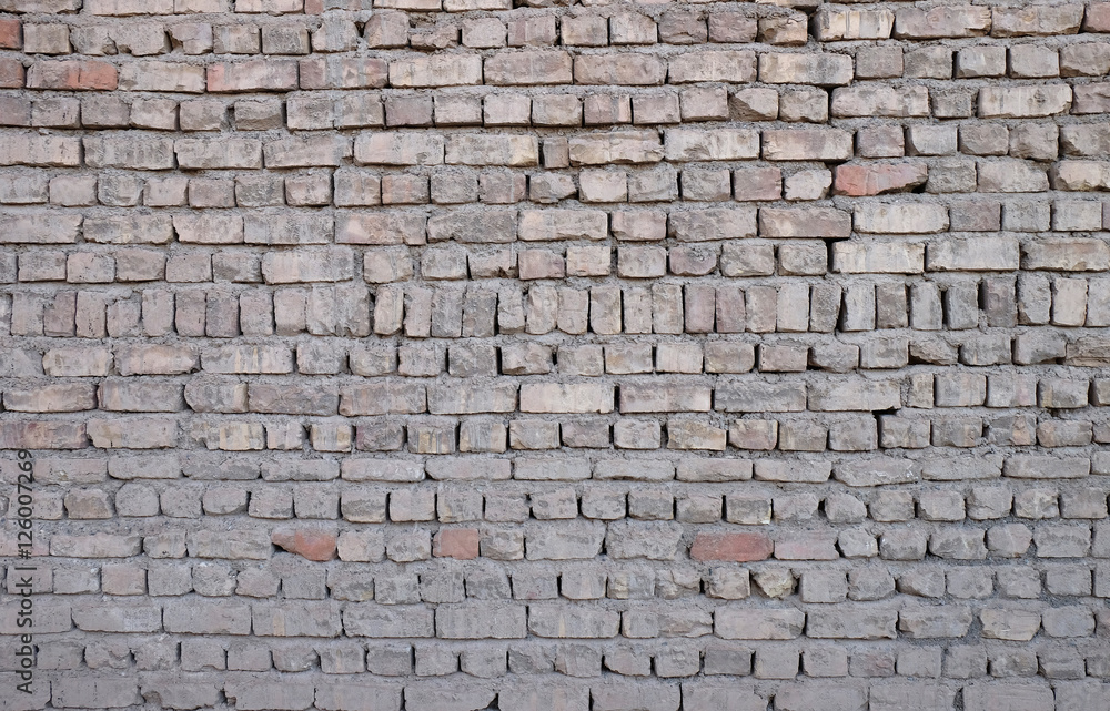 Obraz premium The old wall with brown brick for pattern