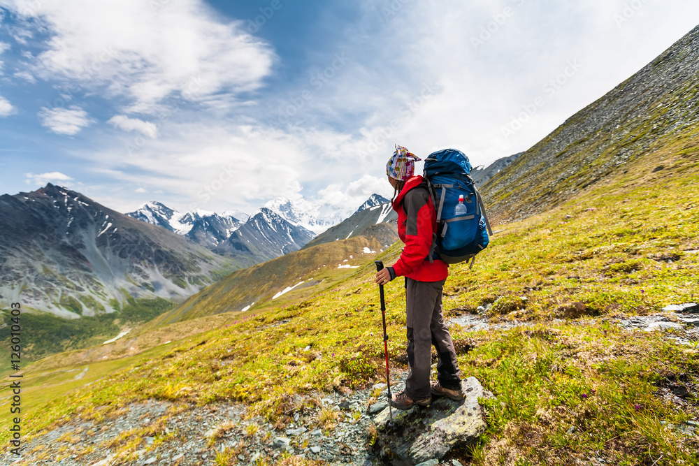 Hiker in highlands of Altai mountains, Russia