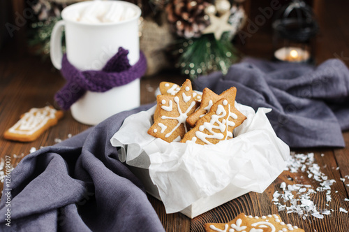 Christmas cookies in box and hot chocolate photo