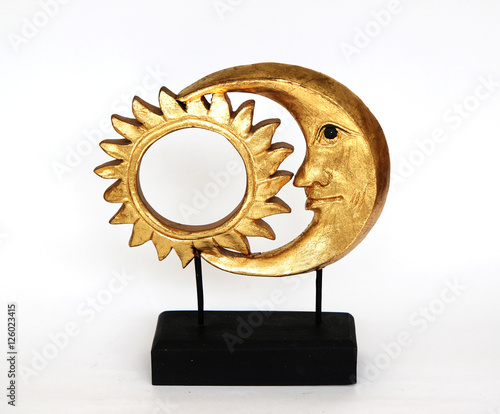 Obraz na plátně sun and moon together, golden statue on white background