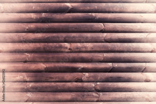 Retro dirt wooden background made by several boards. There is brown