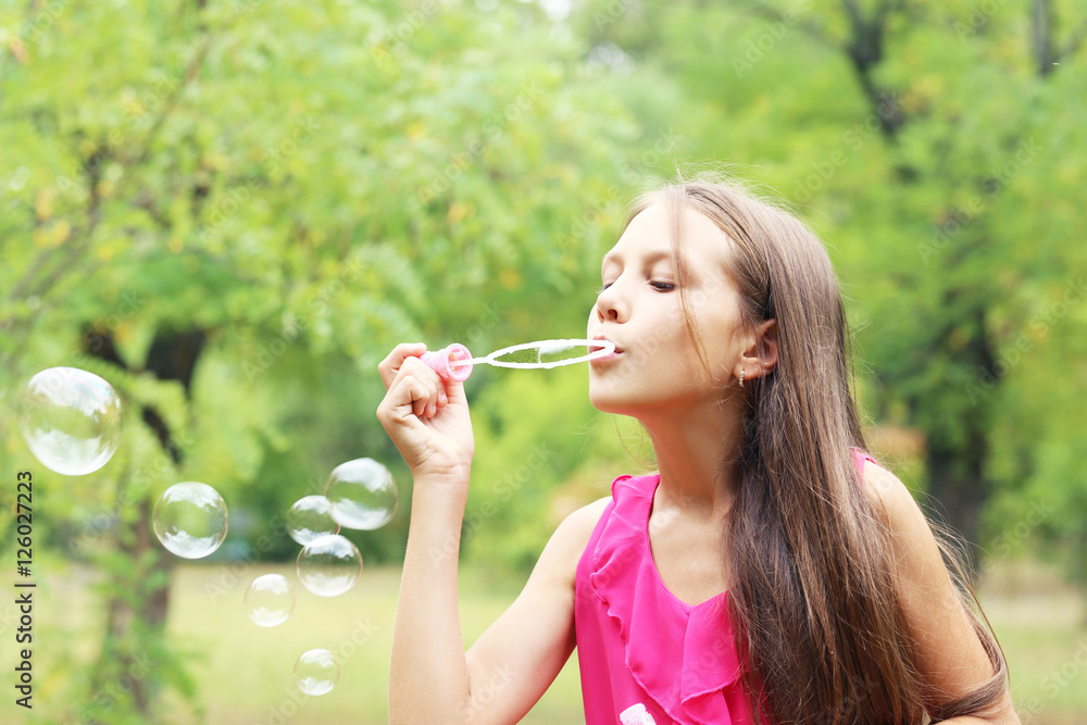 Portrait of little girl in the park