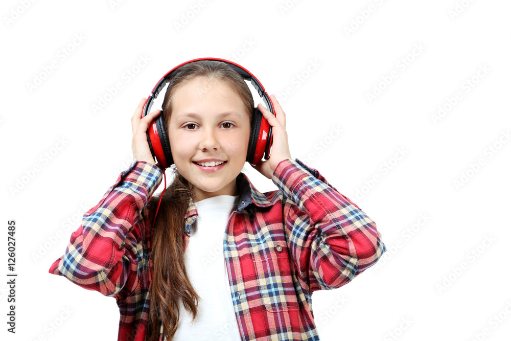 Portrait of young girl with headphones isolated on a white Portrait of young girl with headphones isolated on a white