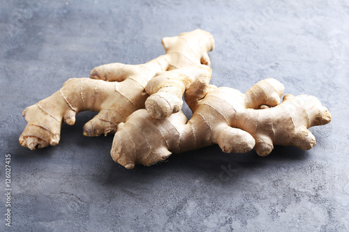 Ginger root on grey wooden table