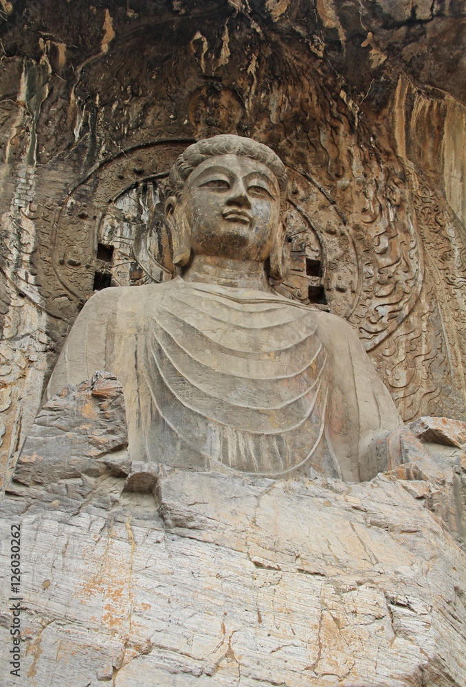 Buddha's statue rock carving in Longmen Grottoes, Luoyang, China Buddha's statue rock carving in Longmen Grottoes, Luoyang, China