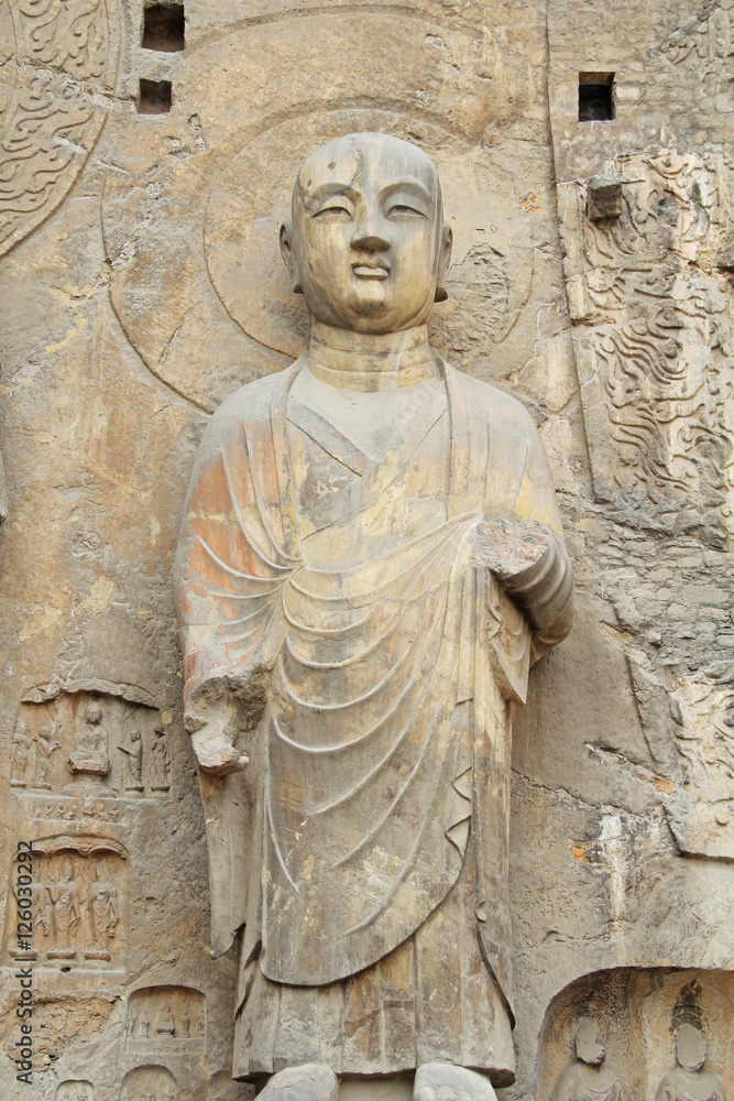 Buddha's statue rock carving in Longmen Grottoes, Luoyang, China Buddha's statue rock carving in Longmen Grottoes, Luoyang, China