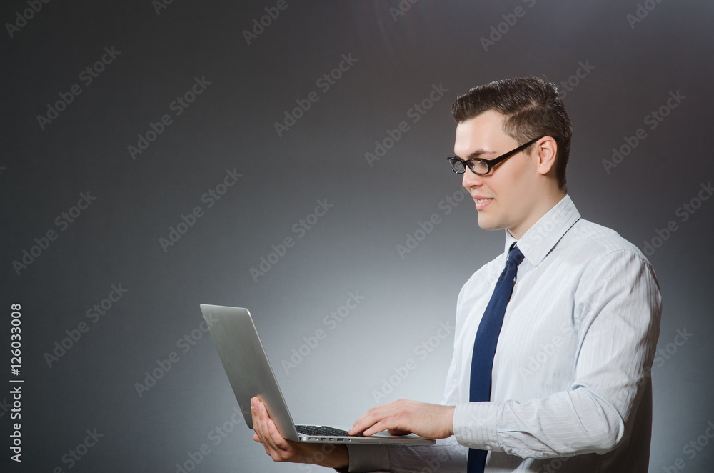 Man with laptop in business concept